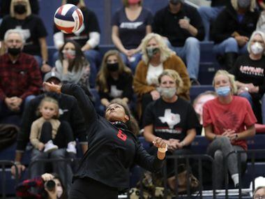 Lovejoy High School player 5, Cecily Bramschreiber, hits the ball during a volleyball...