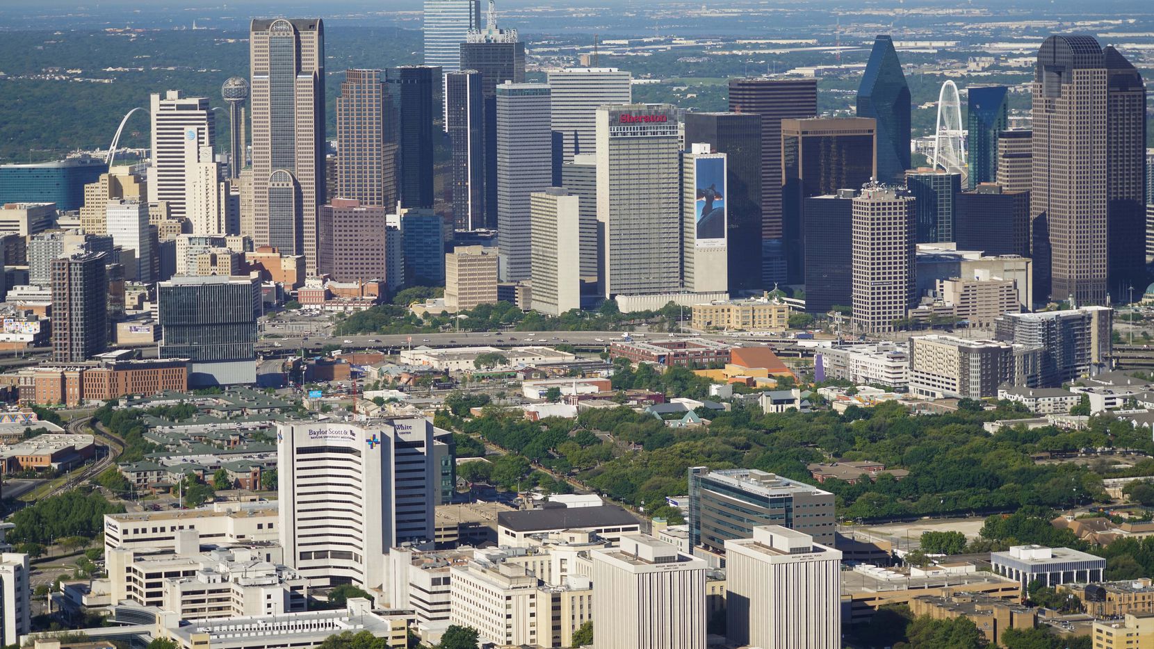 Aerial view of the downtown skyline at top and Baylor University Medical Center at bottom on...