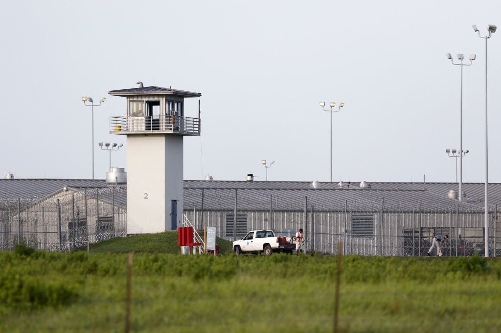 An inmate works outdoors on the "hoe quad" outside a modern-day Texas prison unit in Huntsville, Texas on Thursday, June 25, 2015. (Rose Baca/The Dallas Morning News)
