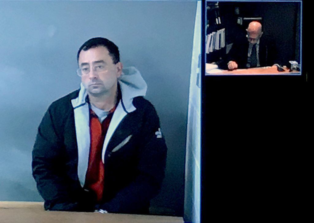 Former Michigan State University doctor Larry Nassar appeared via video link for his...