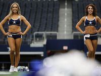Dallas Cowboys Cheerleaders candidates finish their dance routine during auditions at AT&T...