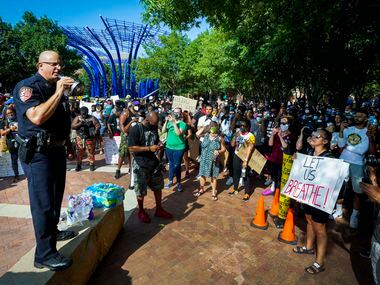 Addison police Chief Paul Spencer addresses a crowd of demonstrators on Thursday, June 4,...