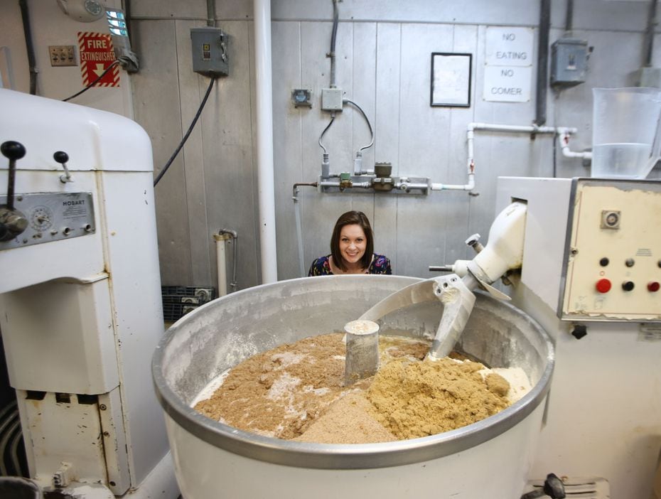 This isn't Honey, I Shrunk the Kids. That's reporter Sarah Blaskovich behind one of the giant mixers at Empire Baking Company in 2018. The bakery remains on University Boulevard in Dallas, but it added a grab-and-go store in April 2021.
