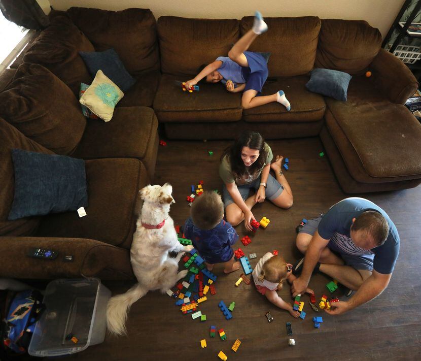 The Clausi family plays together at their home in McKinney, TX, on Aug 20, 2023.  (Jason...