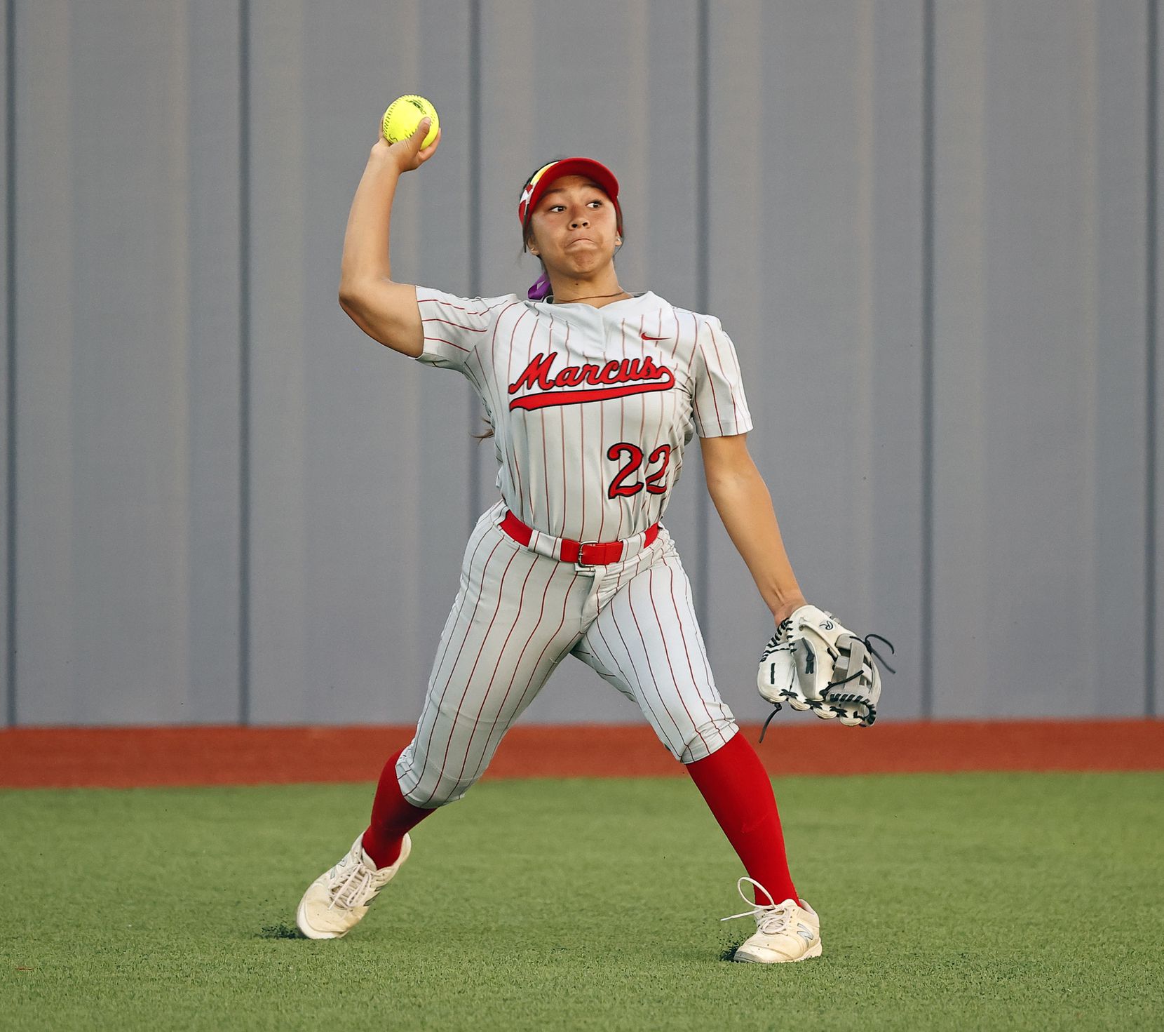 Flower Mound Marcus' Mikaela Olguin (22) throws the ball during the game against El Paso...