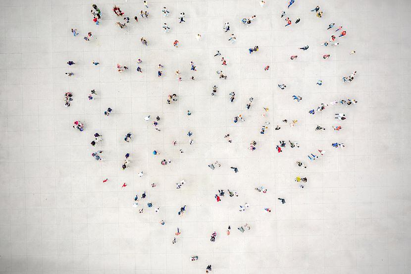 High Angle View Of People forming a heart