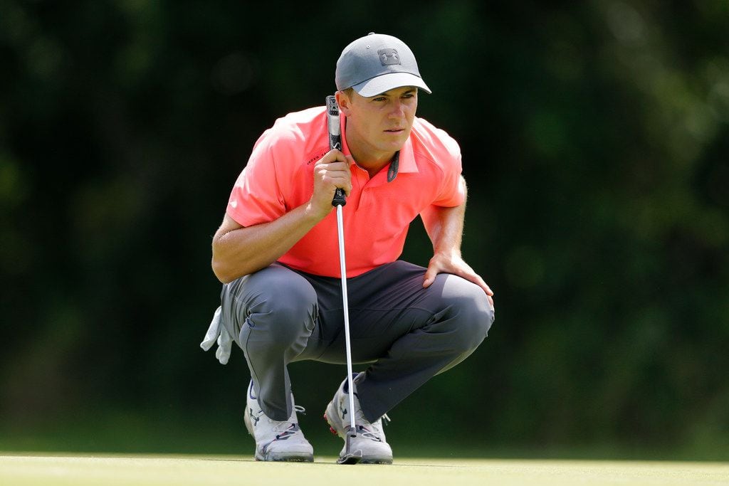 FORT WORTH, TEXAS - MAY 24:  Jordan Spieth of the United States looks over a putt on the...