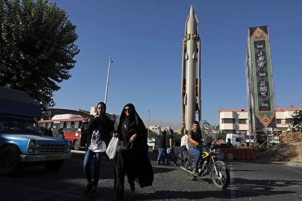 A Shahab-3 surface-to-surface missile is on display at an exhibition by Iran's army and paramilitary Revolutionary Guard celebrating "Sacred Defense Week" marking the 39th anniversary of the start of 1980-88 Iran-Iraq war, at Baharestan Square in downtown Tehran. Iran's defense minister Wednesday rejected the idea of a deal with world powers over the country's missile program.
