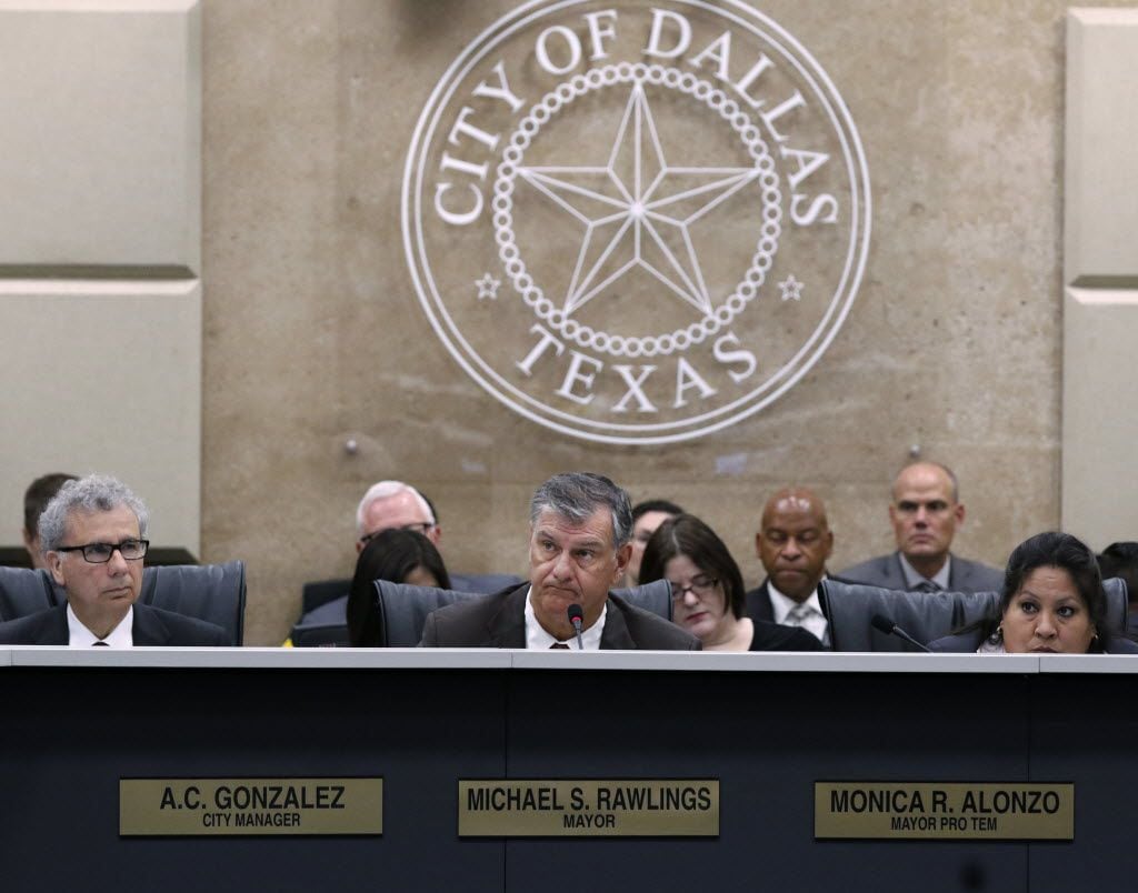 Mayor Mike Rawlings and other city leaders must decide on hiring more Dallas police and...
