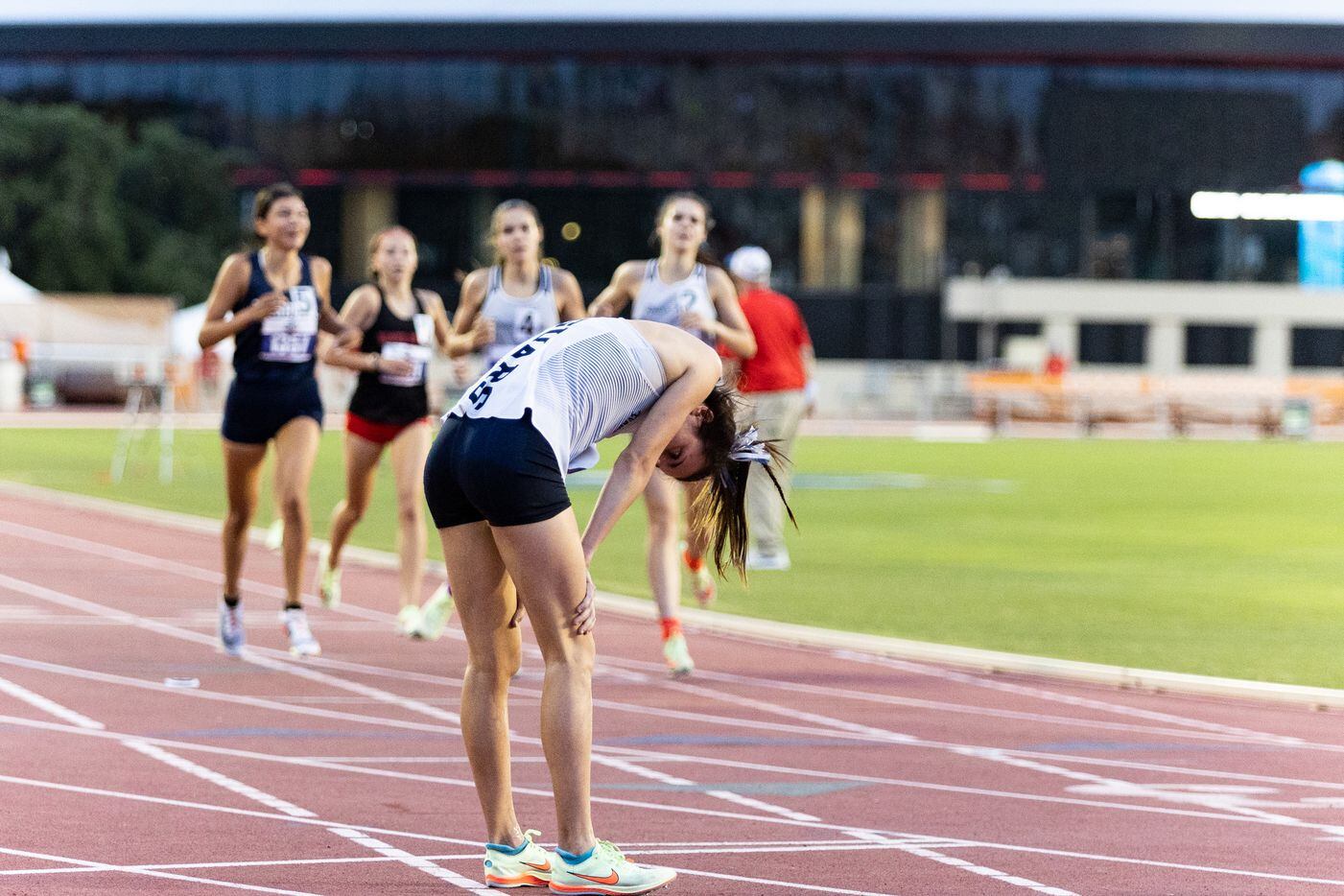 Natalie Cook of Flower Mound catches her breath as the rest of the field finishes in the...