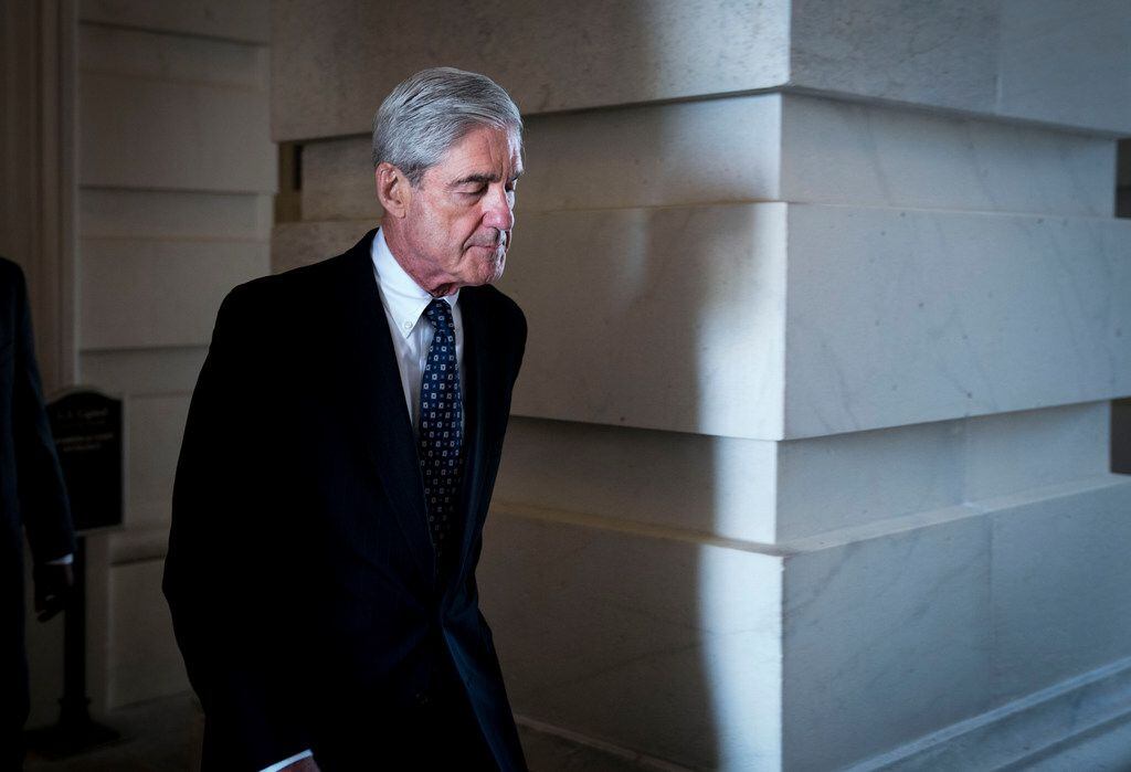 Robert Mueller, the special counsel leading the Russia investigation, leaves the Capitol in...