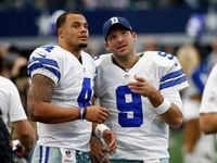 In a Sunday, Nov. 20, 2016, file photo, Dallas Cowboys' Dak Prescott (4) and Tony Romo (9) talk on the sideline in the first half of an NFL football game against the Baltimore Ravens in Arlington, Texas. (AP Photo/Michael Ainsworth, File)