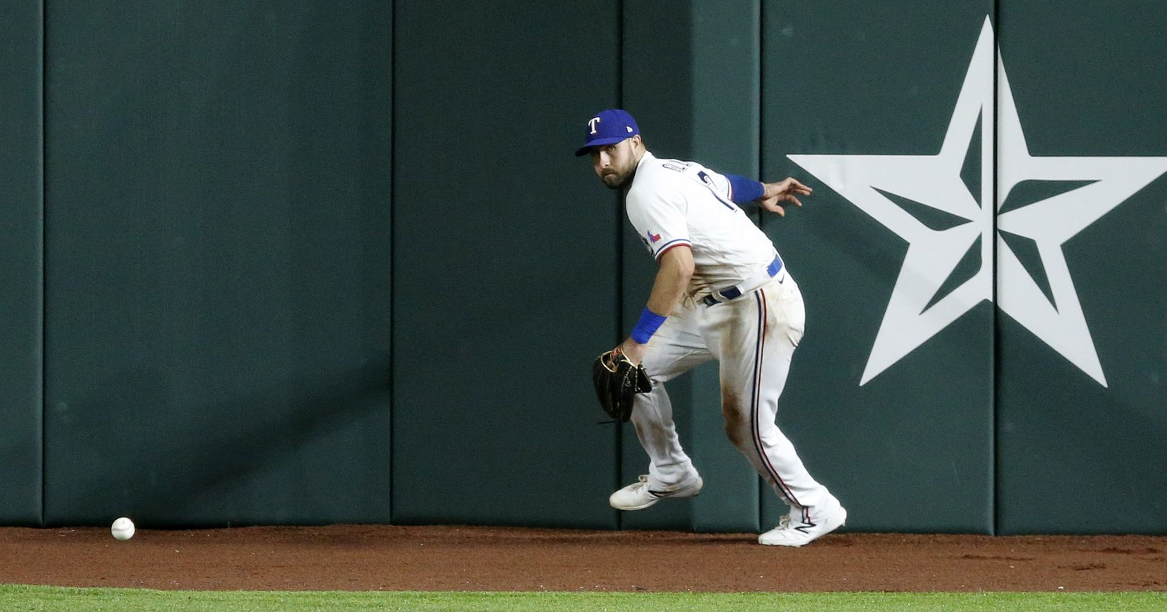 Texas Rangers right fielder Joey Gallo (13) tried to field a fly ball by Arizona...