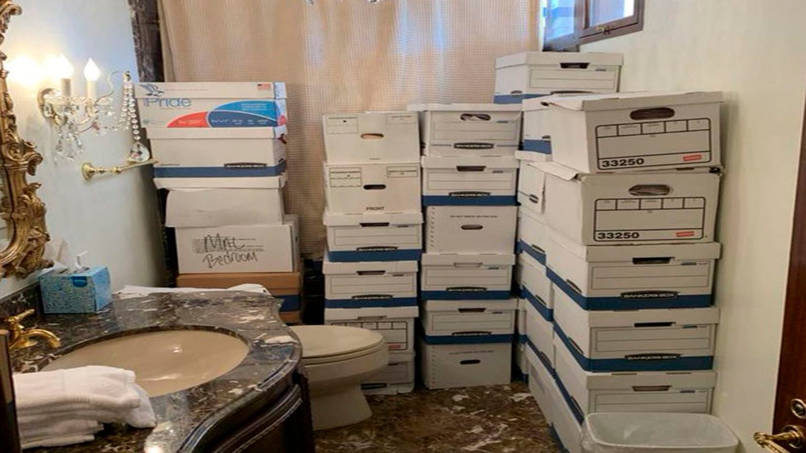 This image, contained in the indictment against former President Donald Trump, shows boxes...