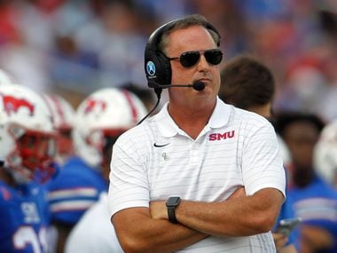 SMU head coach Sonny Dykes looks on from the team bench area during first half action against South Florida. The two teams played their NCAA football game at SMU's Ford Stadium in Dallas on October 2, 2021.