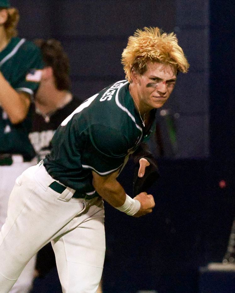 Prosper’s Harrison Rosar (10) celebrates after scoring a run against Coppell during game two...