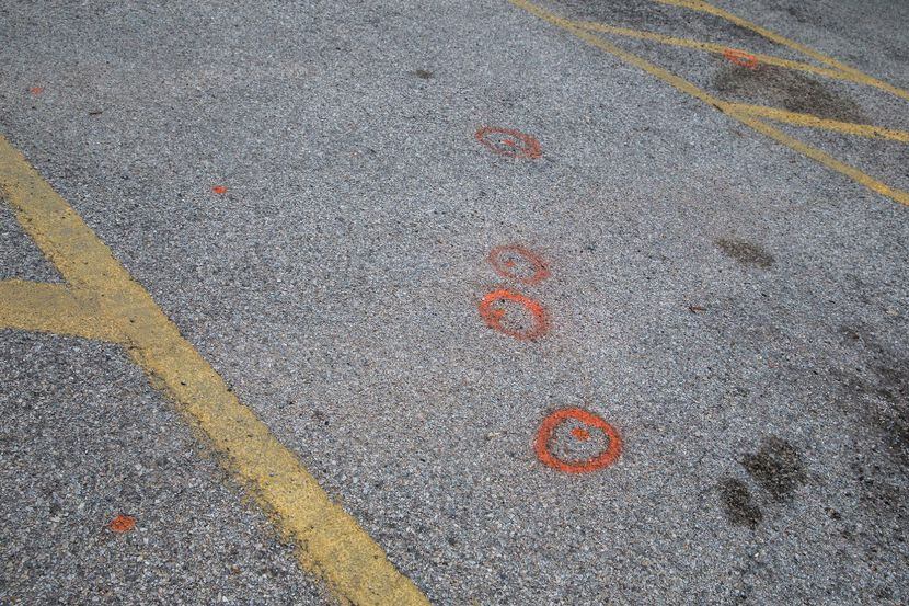 Orange spray painted circles, believed to mark locations of evidence, are shown in 2017 of...