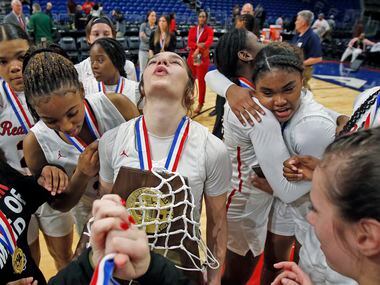 Frisco Liberty Jezelle Jolie Moreno (0) holds their trophy as they Frisco Liberty defeated...