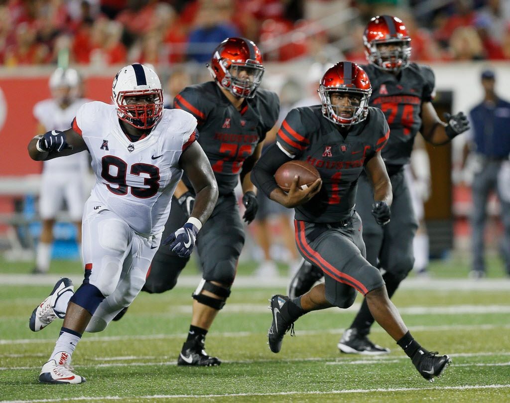 HOUSTON, TX - SEPTEMBER 29: Greg Ward Jr. #1 of the Houston Cougars rushes with the ball as...