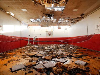 The gymnasium at Cary Jr. High School in Dallas, was damaged by a tornado, Monday, October...