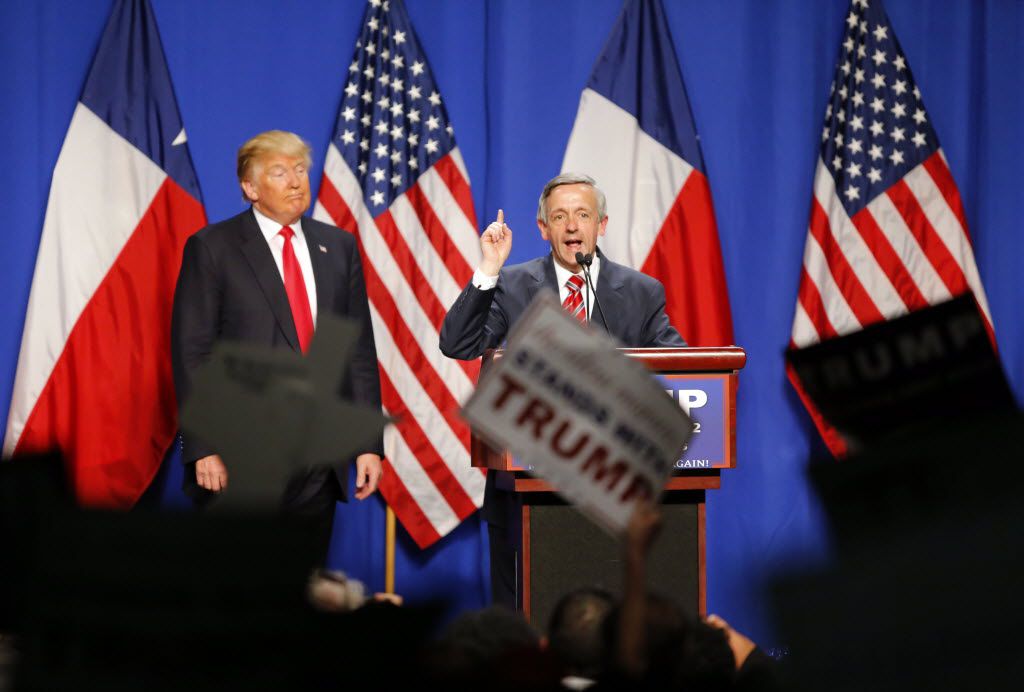 First Baptist Church's Dr. Robert Jeffress speaks on behalf of Republican presidential candidate Donald Trump (left) during a rally at the Fort Worth Convention Center in downtown Fort Worth on Feb. 26, 2016.