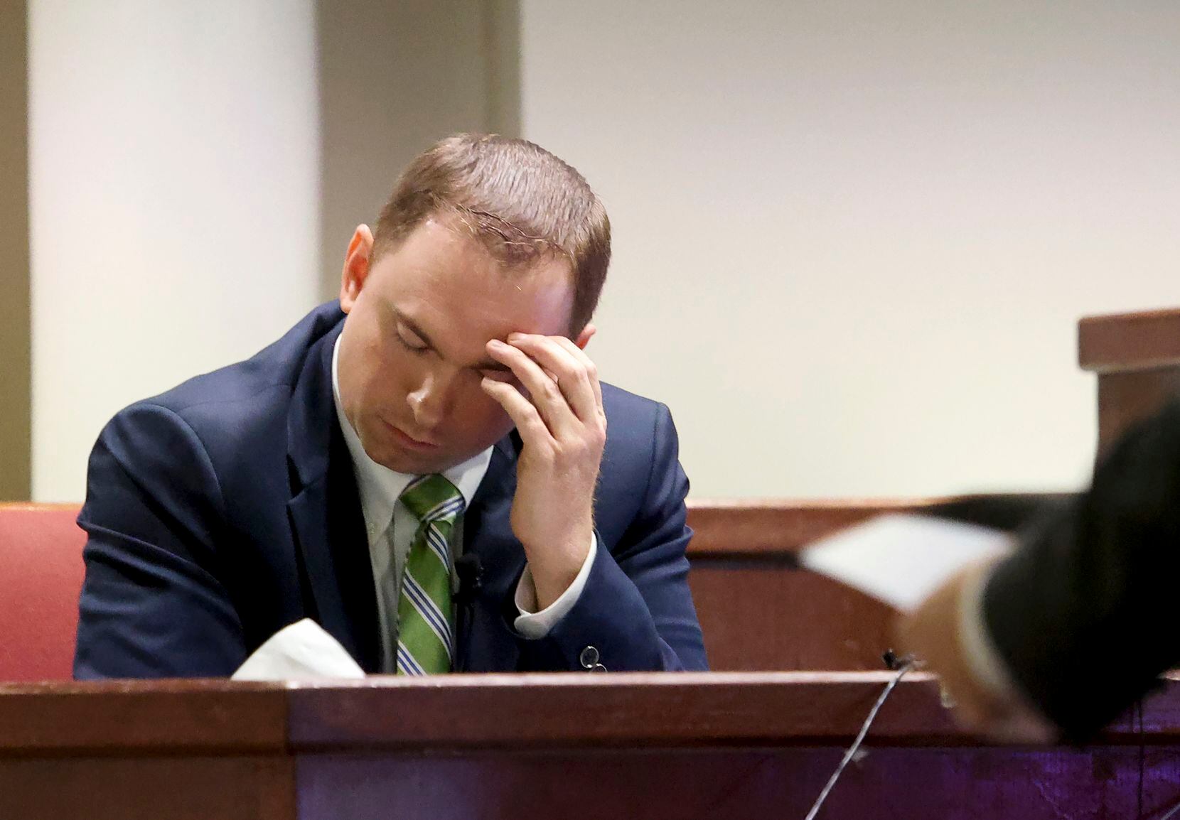 Defendant Aaron Dean reacts while while being cross examined by Assistant Tarrant County...