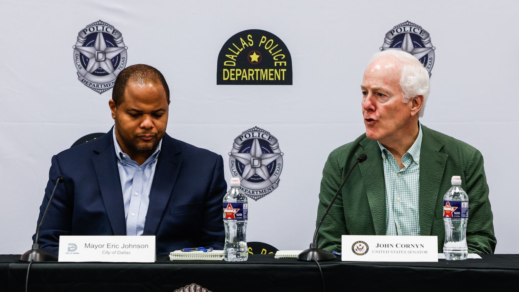 Dallas Mayor Eric Johnson, left, during a discussion panel with Texas Sen. John Cornyn about...