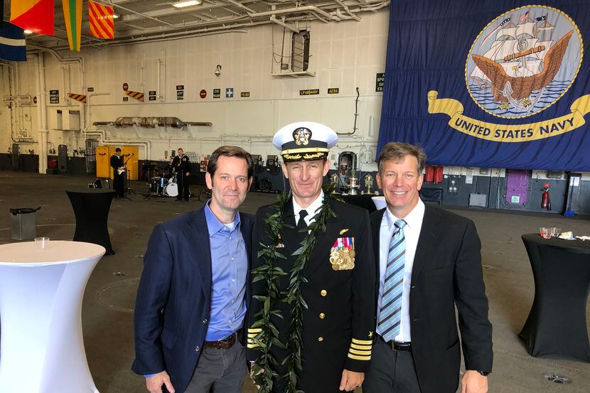 Captain Brett Crozier (center) with Naval Academy classmates Brett Odom (left) and Mark...