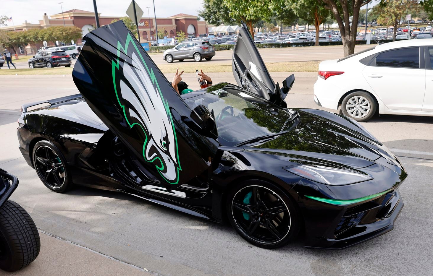 A Philadelphia Eagles fan shows off his custom Corvette before Monday Night Football at AT&T...