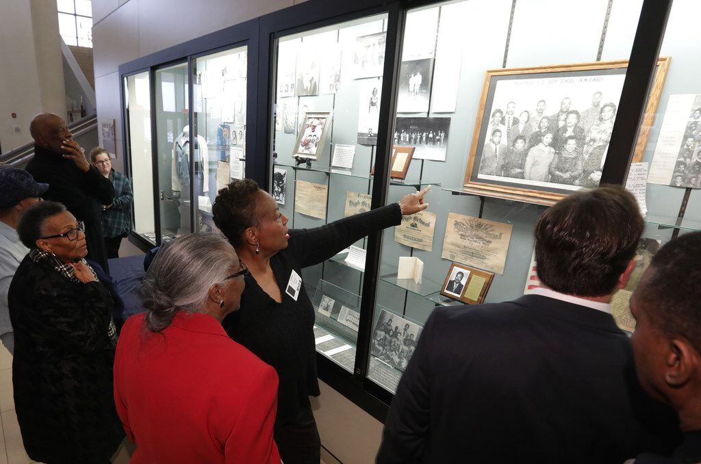 Dorothy Shaw points out some teachers she remembers from her childhood during a historical...