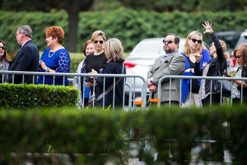 Members of the public arrive to view the casket of former first lady Barbara Bush on Friday,...