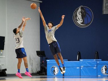 Dallas Mavericks guard Carlik Jones (23) and forward Feron Hunt play one-on-one during a training camp practice Wednesday, September 29, 2021 at the Dallas Mavericks Training Center in Dallas.