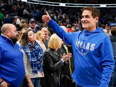 Dallas Mavericks owner Mark Cuban gives a thumbs up to the crowd as he leaves the court after a victory over the Toronto Raptors in an NBA basketball game at American Airlines Center on Saturday, Nov. 16, 2019, in Dallas.