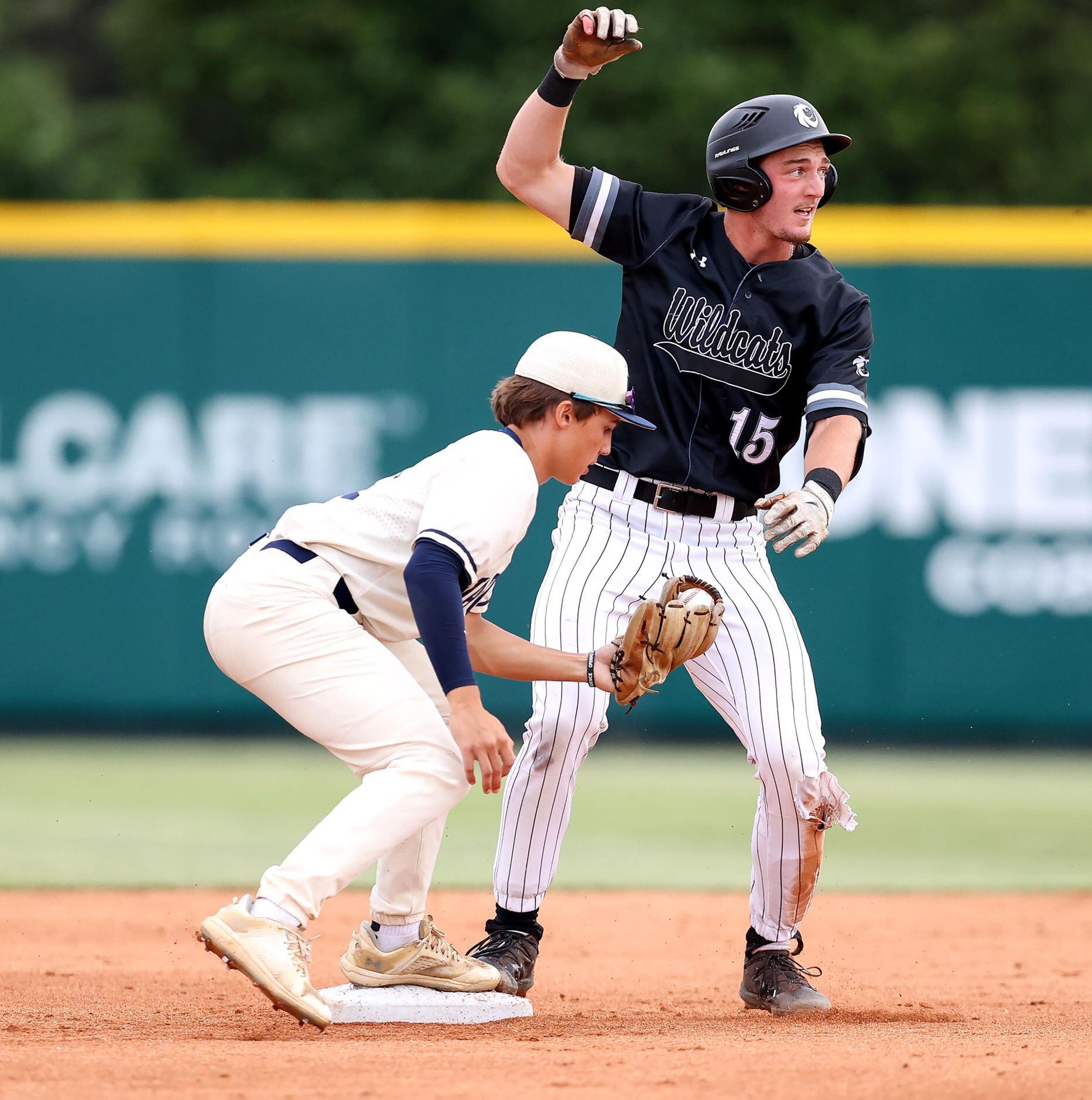 Denton Guyer shortstop Lane Allen (15) gets into second base before the tag from Flower...