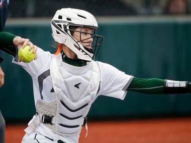 Prosper catcher Elizabeth Moffitt throws before game one of a best of three series of a...