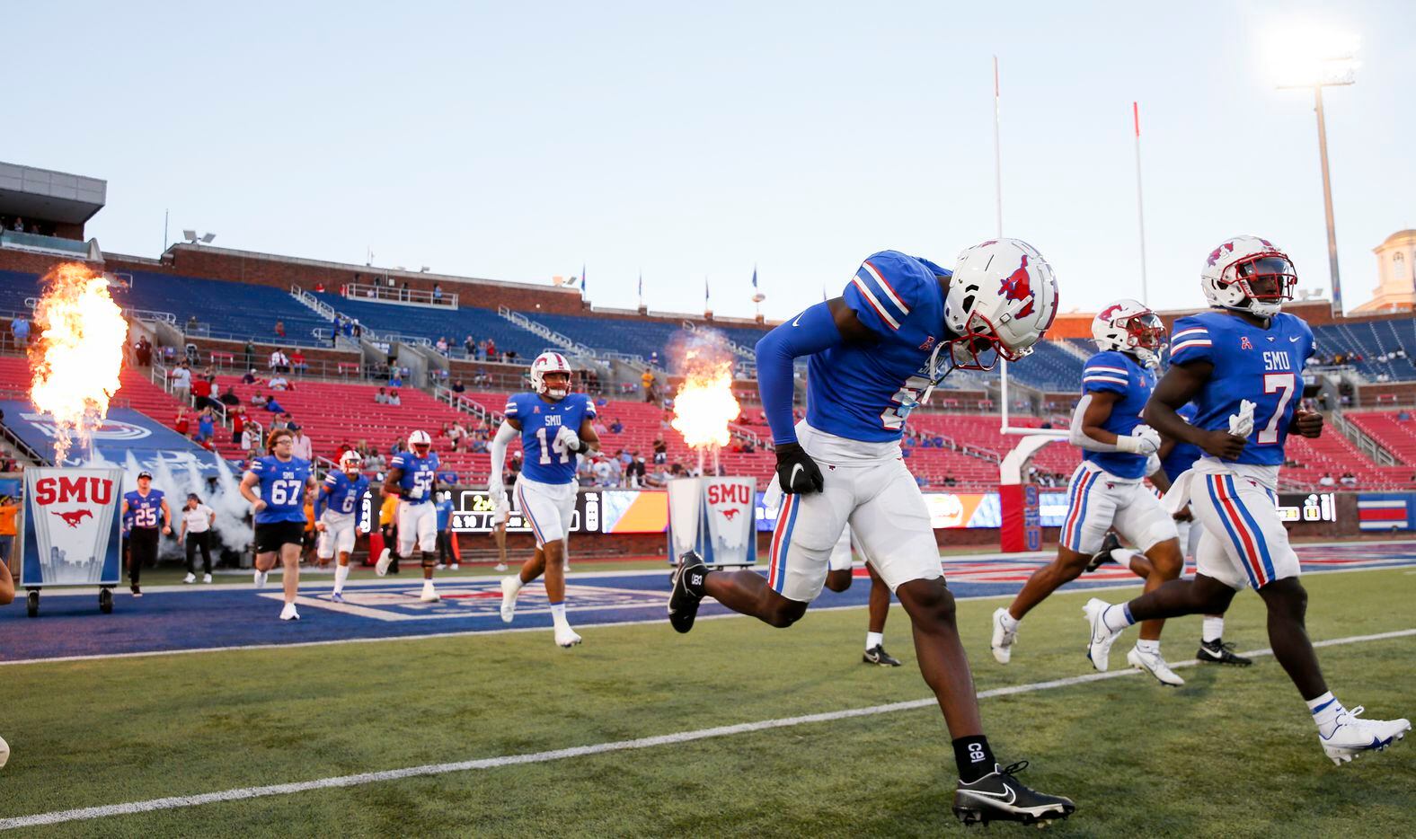 Southern Methodist Mustangs run out before the start of a game against the Tulane Green Wave...