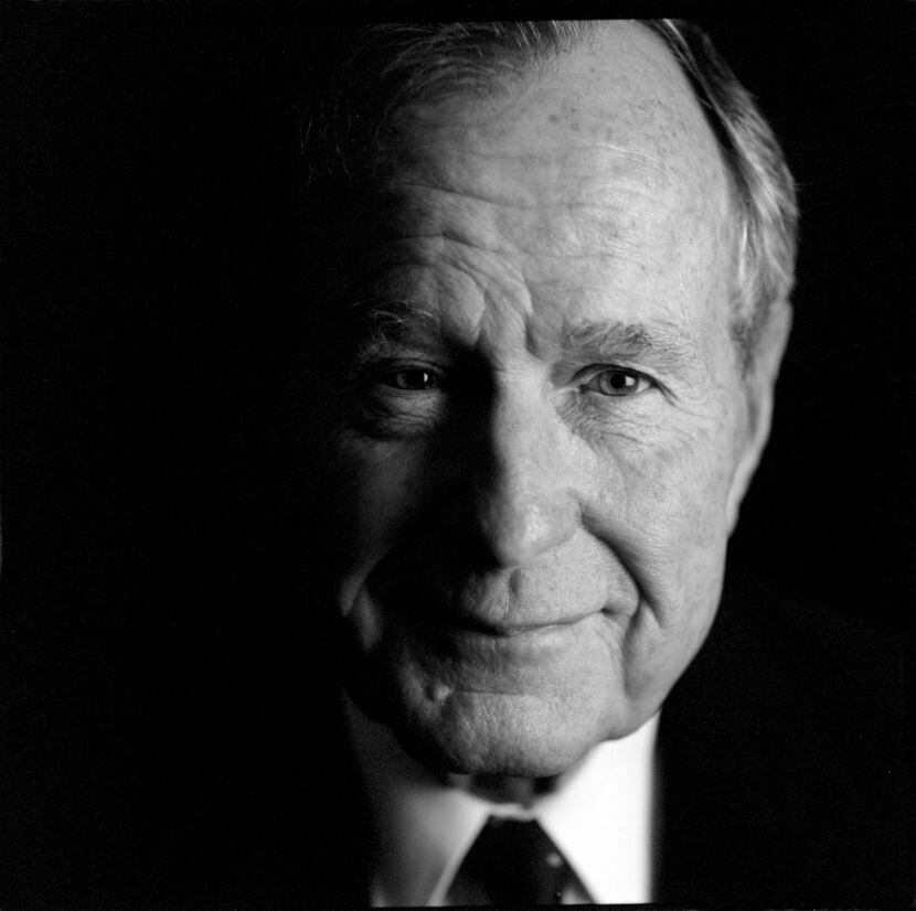 Former President George H. W. Bush in 2002 at the George Bush Presidential Library and...