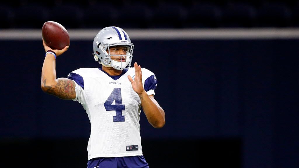 Dallas Cowboys quarterback Dak Prescott (4) tossed a pass during practice at The Star in...