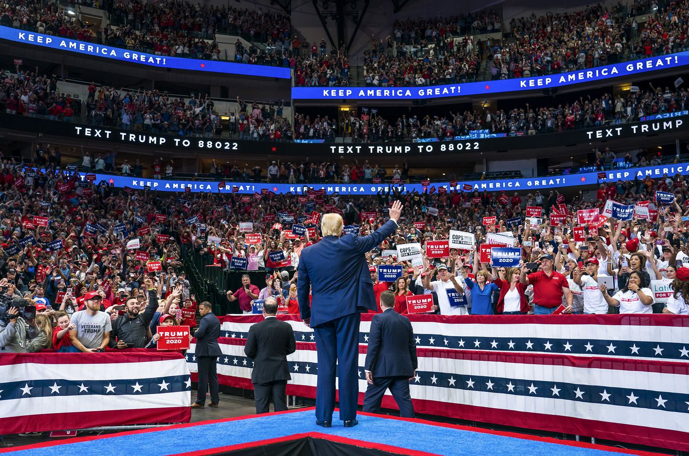 President Donald Trump acknowledges the crowd as he arrives for a campaign rally at the...