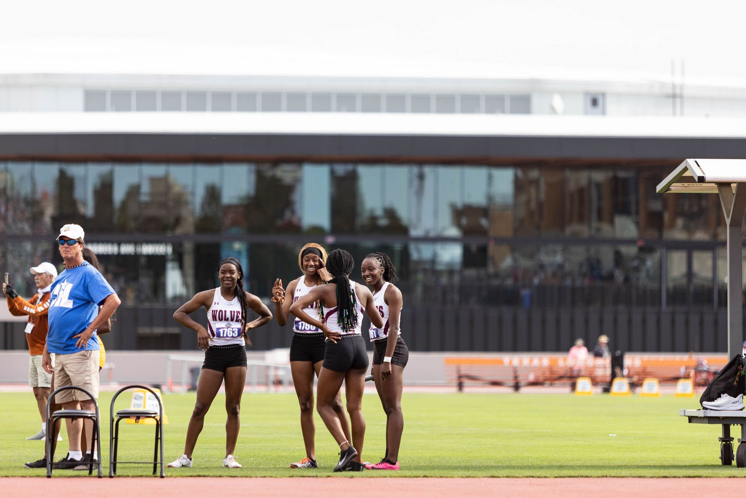 The Mansfield Timberview girls’ 4x100 relay waits for the medal ceremony after winning the...