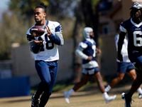 Dallas Cowboys wide receiver Jalen Tolbert (18) pulls in a pass completion during a walk...
