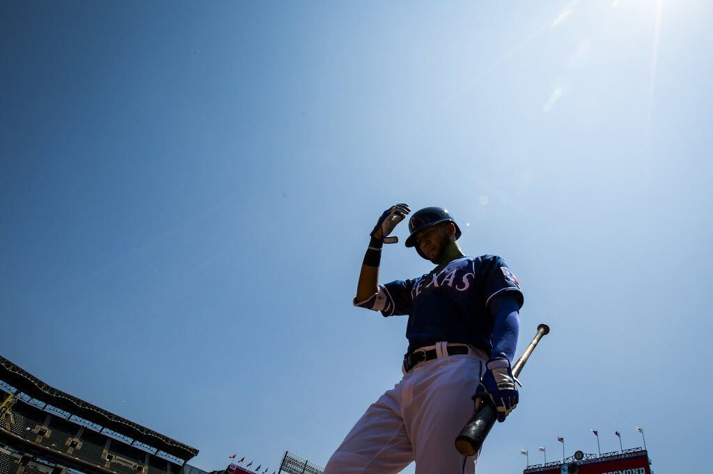 Texas Rangers right fielder Nomar Mazara heads to the on deck circle during the third inning...