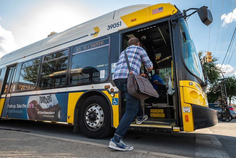 Doyle Rader, a longtime rider of DART, stepped onto a bus Tuesday at the intersection of...