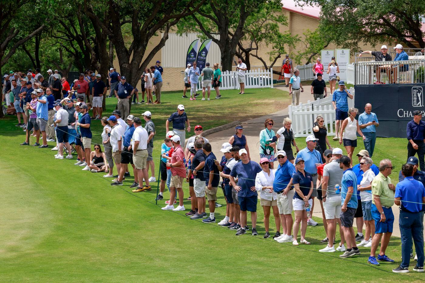 Golf fans line the 18th fairway during the first round of the ClubCorp Classic at Las...