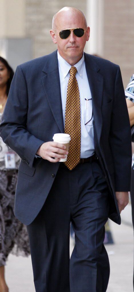 Former FBI agent Don Sherman, who worked on the Hill and Price cases, walked to the Dallas...