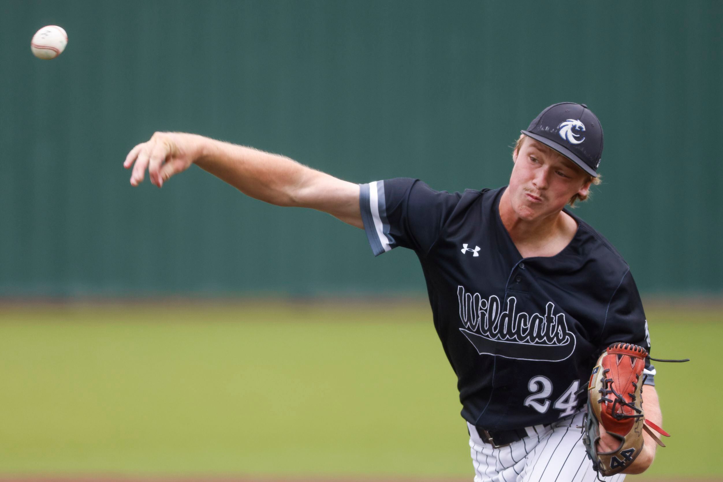 Denton Guyer’s Brad Pruett throws a pitch during the first inning of a baseball game against...