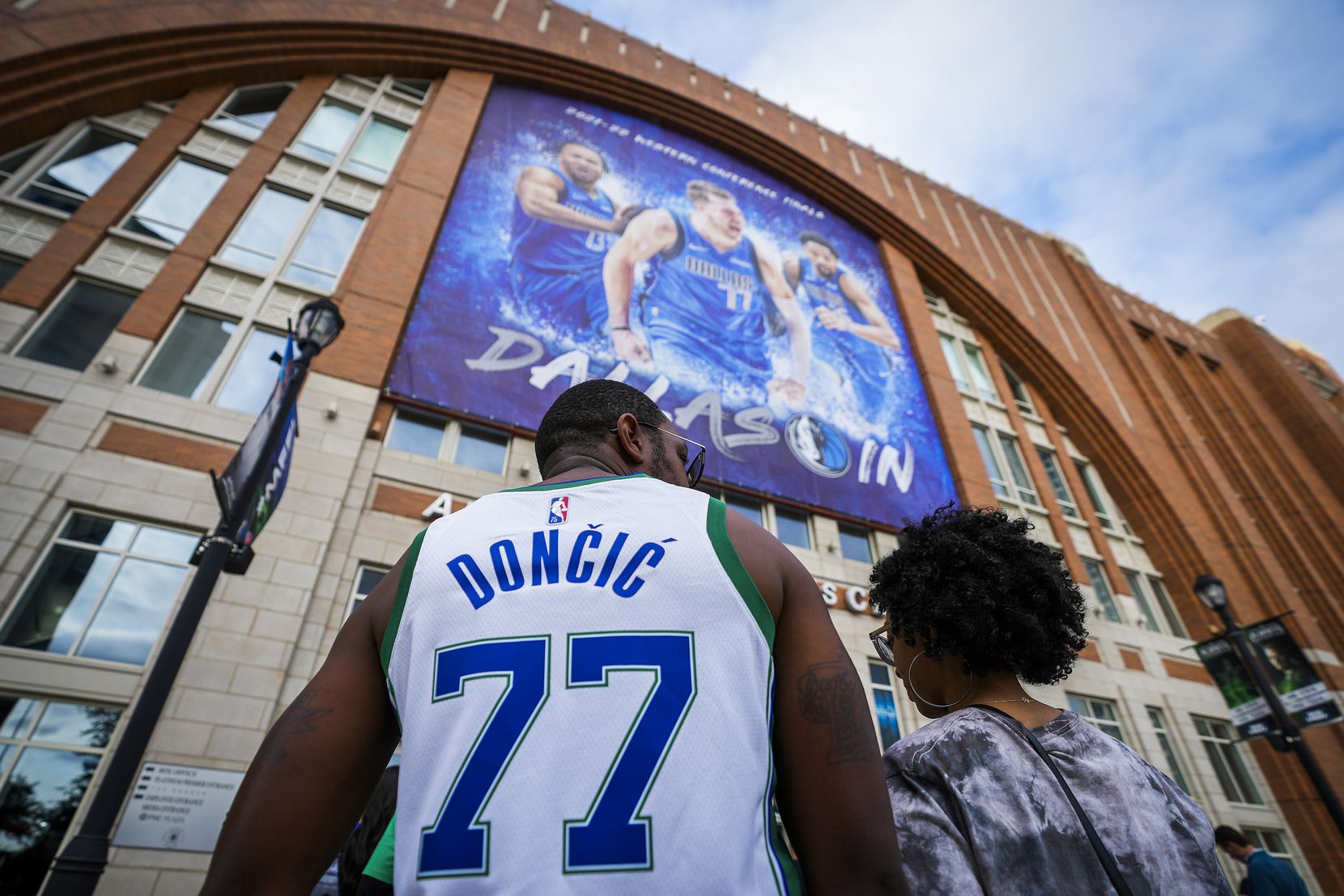 Dallas Mavericks fans wait to enter the arena before Game 3 of the NBA Western Conference...