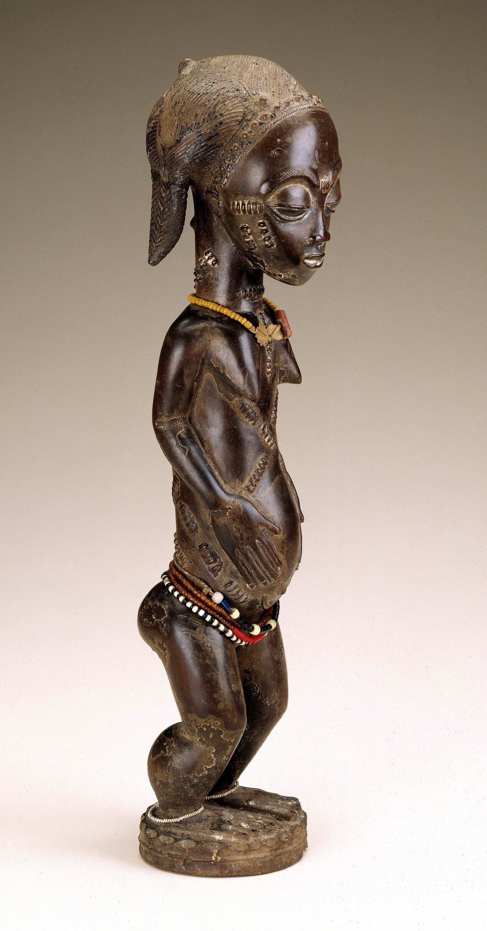 This 19th-century female figure from Ivory Coast is included in the exhibition, which runs...
