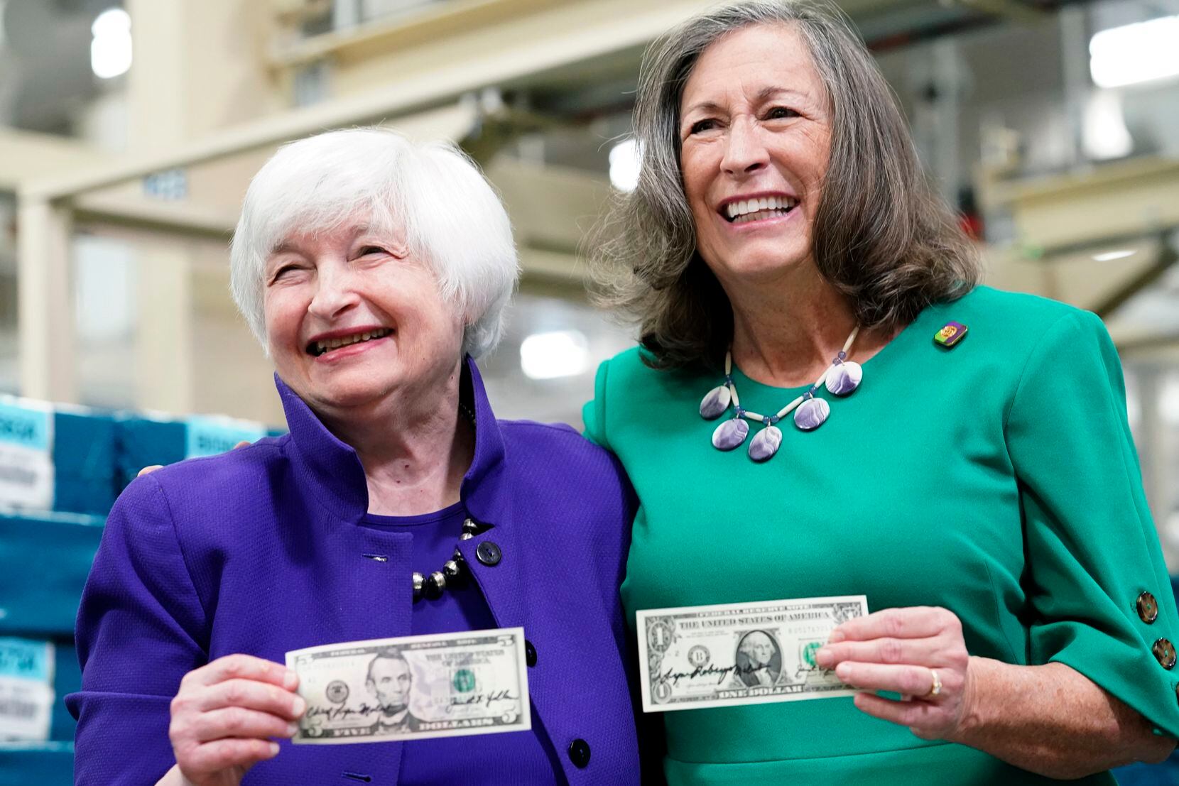 Treasury Secretary Janet Yellen, left, and U.S. Treasurer Lynn Malerba show off money they...