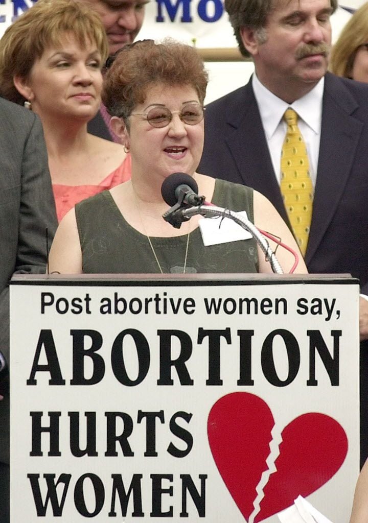 Norma McCorvey, at microphone, plaintiff in the 1973 landmark case that legalized abortion,...